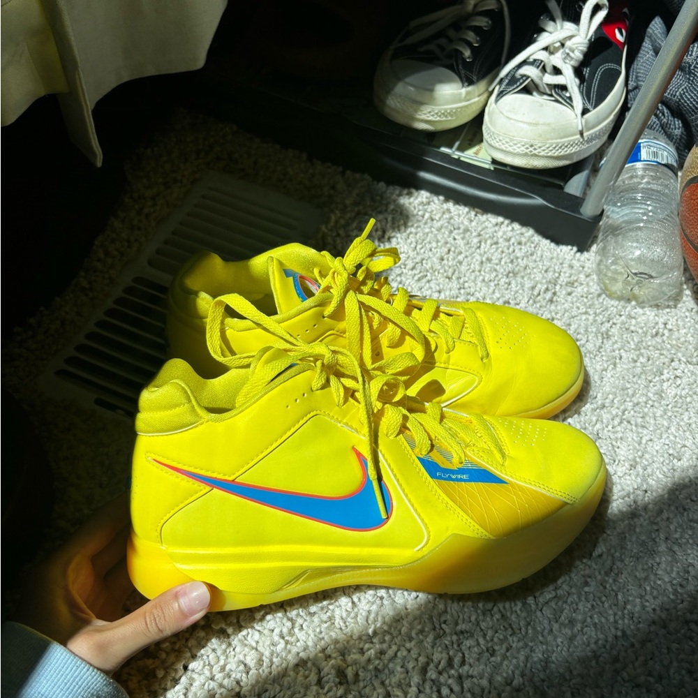 Nike Bright Yellow High-Tops with Blue and Red Accents